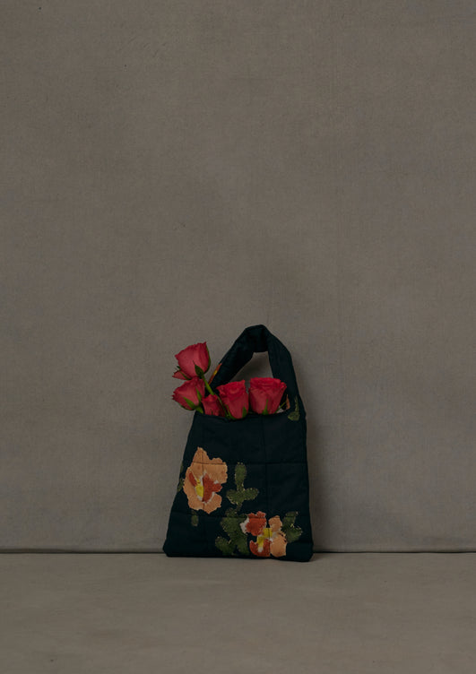 Bag with black floral print